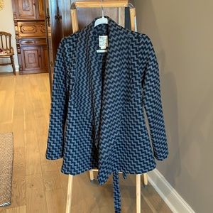 Warm, cozy and casual. Pair with jeans, leggings, or skirt!! Just grab and go!!